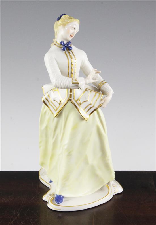 A Nymphenburg porcelain figure of Julia, after the Komedia Del arte figure by Bustelli, 20th century, 8.25in.